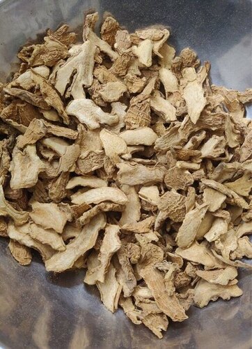Dried Ginger Chips - Chemical-Free, Golden Brown Color | Crisp Texture, Rich in Nutrients, Pungent Aroma, Sour Taste