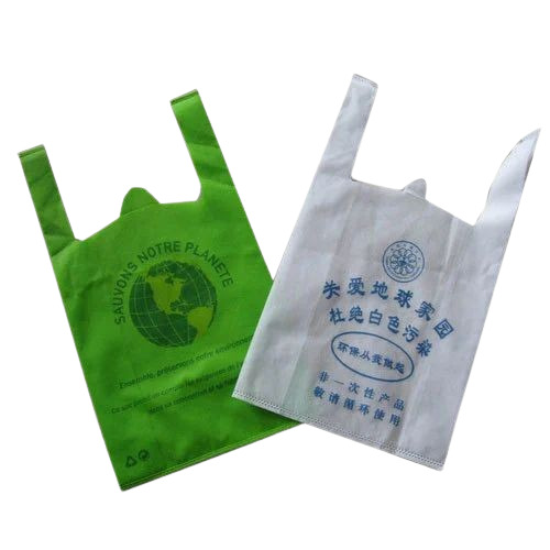 Non Woven Carry Bag - 1 Kg Capacity, Printed Design with W Cut Handles