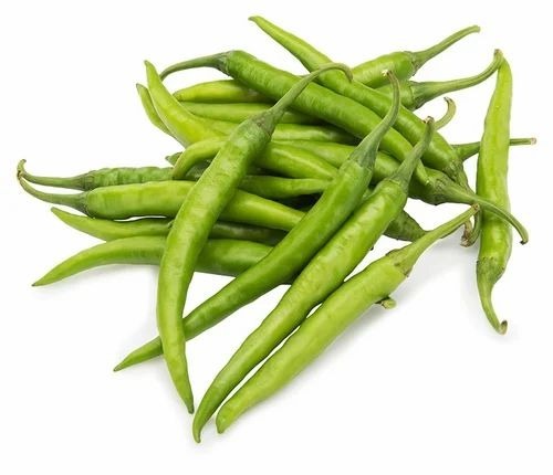 Fresh Green Chilli - 4 Inches, A Grade Quality, Indian Cuisine, Carton Packaging, Common Shape, One Month Shelf Life, Cooked Style