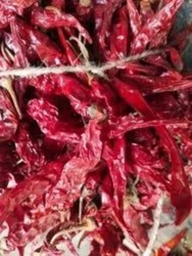 Guntur Dry Red Chilli - Dried With Stem, Very Good Quality, Spicy Flavor, A Grade, Fried Processing, 12 Months Shelf Life, Store in Cool and Dry Place