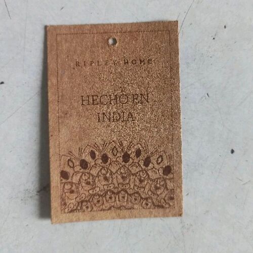 Brown Paper Clothes Hang Tag - Material: Paper, Size: 50x15mm, Color: Brown, Shape: Rectangular, GSM: 50 , Features: In-Mound Label, Design Printing Available