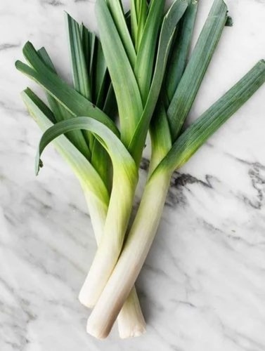 Fresh Green Leek Flake - Variety Available: Exotic Vegetable, Color: Green and White, Potassium: 180 mg, Calories: 61 | A Grade Quality, Chopped, Common Shape, Cooked Style, 2-Week Shelf Life