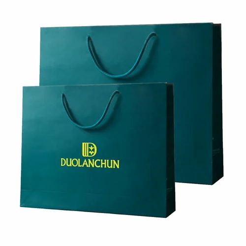 Printed Paper Bags - 10 kg Capacity, 5 mm Thickness, Moisture Proof , Biodegradable & Recyclable with Rope Handles