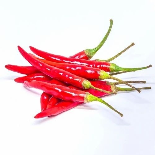 Red Chilli - Grade A, Red Color, Packet Packaging | Chopped Processing Form, Common Shape, Cooked Style