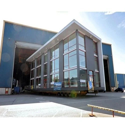 Prefabricated Office Buildings - Galvanized Metal Sheet, Upto 30 m Height, Cream or Custom Color - Five Doors with Aluminum and PVC Windows, Multi-Purpose Use for Carports and Restaurants