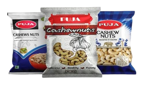 Cashew Nut Packaging Pouch - PET Material, Multi Color, Printed Design | Pillow Pouch, Glossy Finish, Heat Sealed Closure, Double Layer Lamination