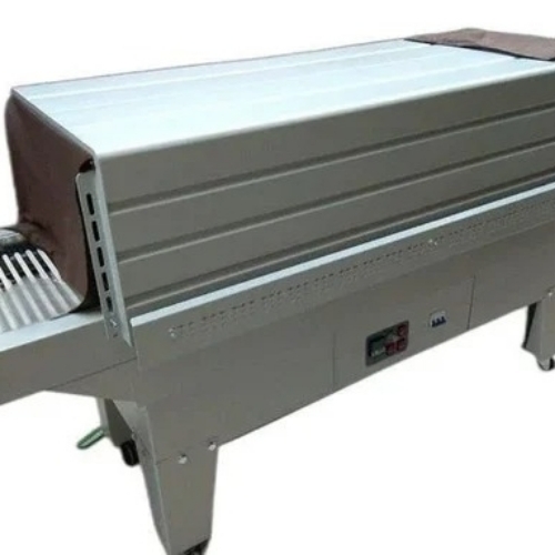 Shrink wrapping machine