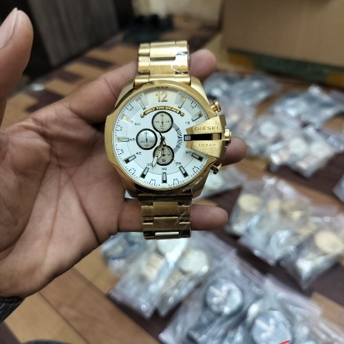 Gold and white watch