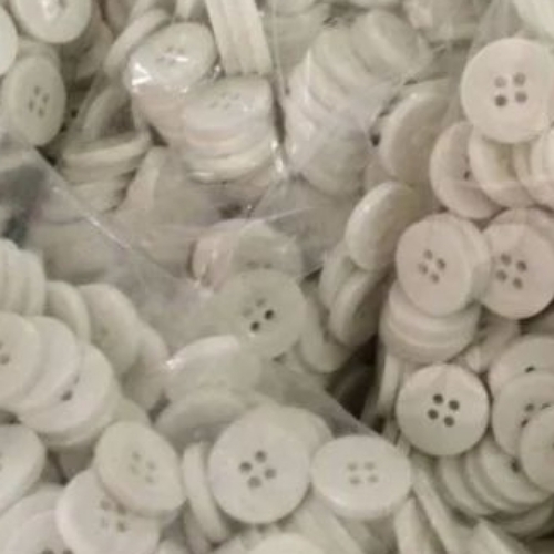 White Plastic Buttons