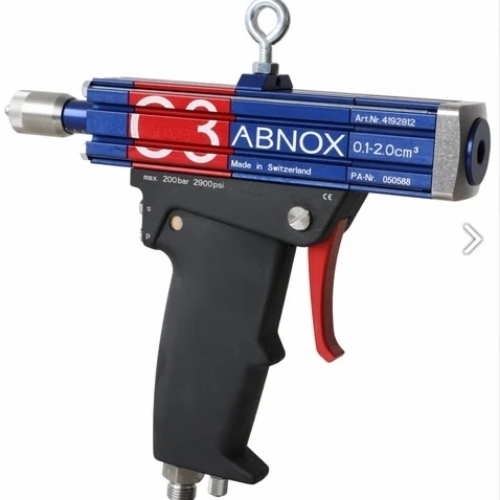 Volumetric grease dispenser