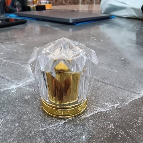Perfume bottle cap