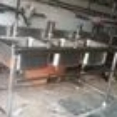 Sanitizing sink with pipe bracing