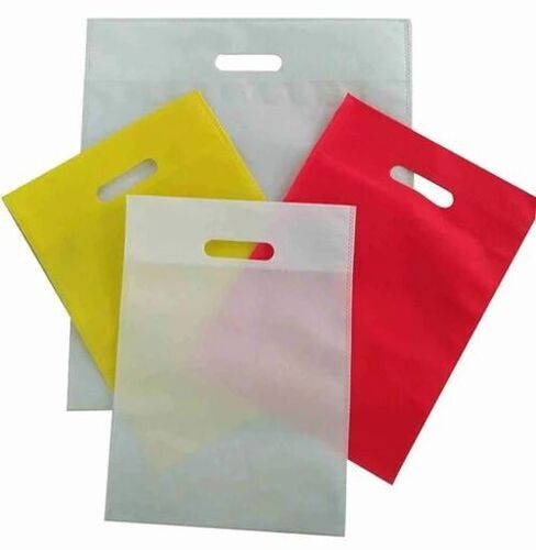 D-Cut Non Woven Bags - Non Woven, 1 Kg Capacity, Multi Color | Biodegradable, Glossy Finish, Hand Length Handle, Water Resistant