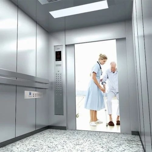 Hospital Passenger Lift - Stainless Steel SS304, 1500kg Load, 13 Persons, 10 Stops, AC Geared Traction, Automatic Door
