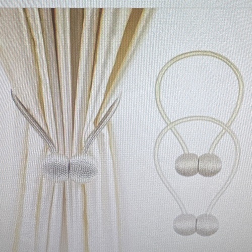 Magnetic curtain holder tiebacks