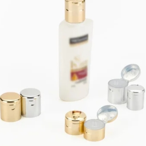 Silver and golden jar cap