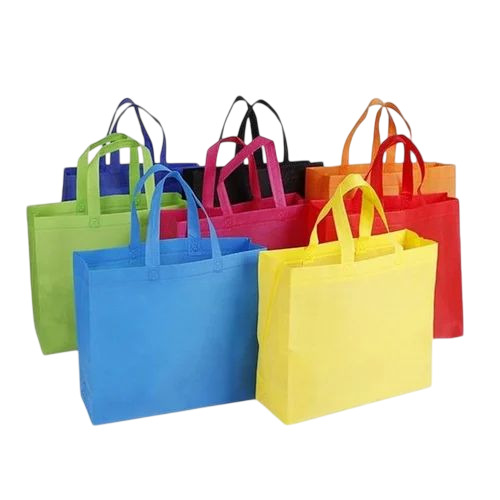 Colored Non Woven Carry Bag - Non Woven, Customized Size, Multiple Colors, 90 GSM, Durable | Eco Friendly, Perfect Finish, With Handle, 5 Kg Load Capacity