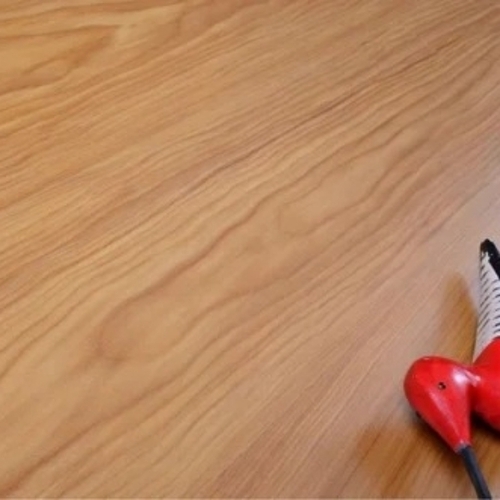 Universal Honey Oak Laminated Flooring