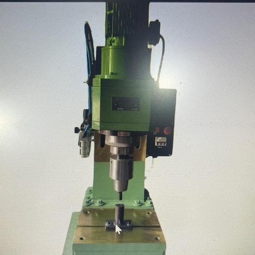 Orbital riveting machine
