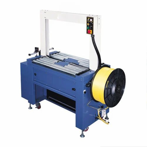 Fully Automatic Strapper With Roller Driven Table