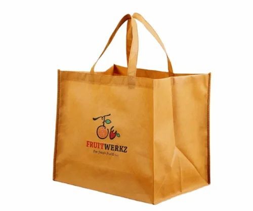 Customized Yellow Loop Handle Non Woven Box Bottom Bag - 25Kg Capacity, Printed, Matt Finish, Water Resistant, Eco Friendly