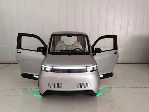Fully enclosed three seater electric mobility scooter with 4 wheels