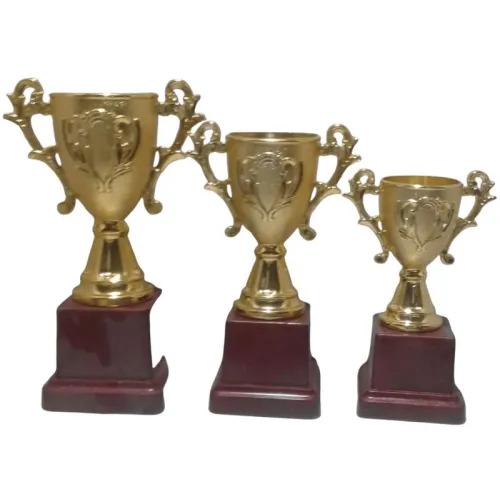 Gold Plated Metal Trophy With Brown Wooden Base