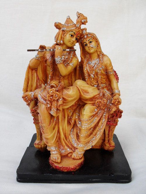 Radha Krishna Sitting On Sofa