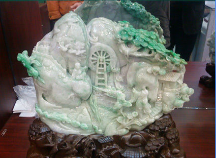 Jade Caving Statue