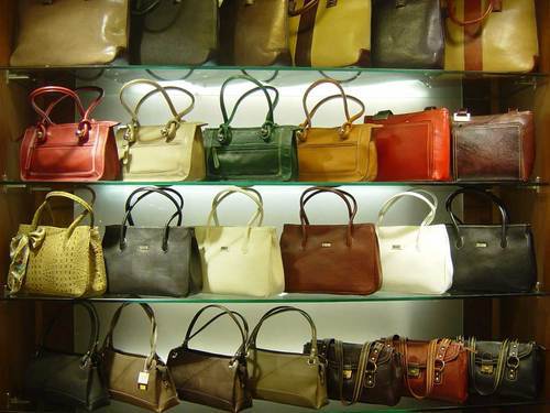 Image of beautiful woman purse handbag hanging on a shop-WO779752-Picxy
