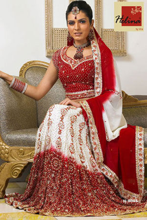 Sara Ali Khan in a heavily embellished designer lehenga-choli at a wedding  event in Mumbai. The orange and gold d… | Orange lehenga, Designer lehenga  choli, Lehenga