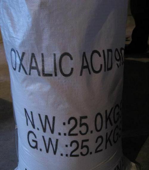 Oxalic Acid - 99.6% Total Acidity, 0.1% Max Ash, 0.02% Max Iron, Packed in 25/50 kg Grey PP Bags