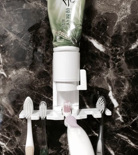 Toothpaste Dispenser With Toothbrush Holder