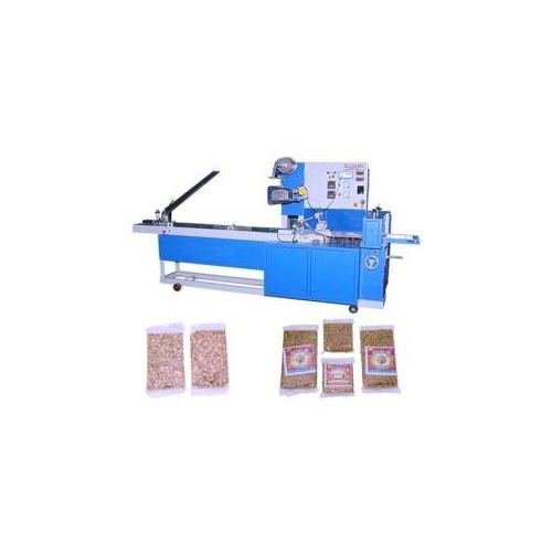 Chikki Packaging Machine - Stainless Steel, Flexible Bag Length Cutting , Adjustable Folding Box, Conveyor Error Detection System, Optical Electric Color Mark Tracking, Unique PID Temperature Controller