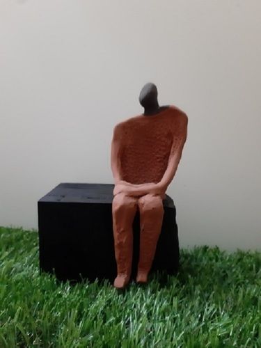 Venuz Sitting Man Artifact