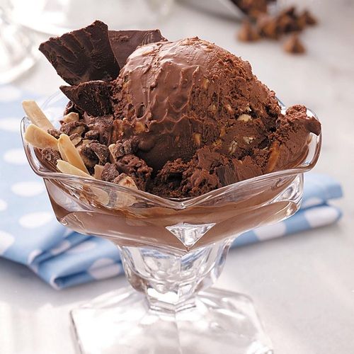 Mouth Watering And Melting Sweet Tasty Cold Brown Chocolate Ice Cream Swirls