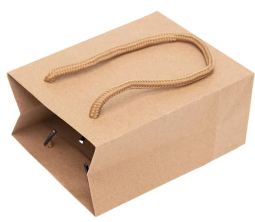 Brown 18X4 Inches Biodegradable Hand Length Handle Kraft Paper Shopping Carry Bag