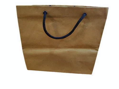 Brown Paper Carry Bag - Paper Material, 17x4x14 Inch Size, Brown Color | Biodegradable, Moisture Proof, Recyclable, Rope Handle, Plain Style