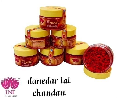 Yellow Chandan Danedar Tika