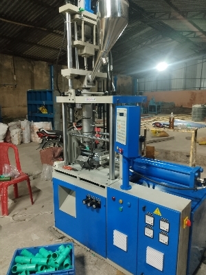 Vertical HDPE Plastic Injection Moulding Machine - 5-100 Grams Capacity, Three Phase Power Source, 380 Volt Voltage, Automatic Operation, Human Machine Interface Control