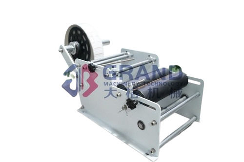 Semi Automatic Hand Labeling Machine - Stainless Steel, 600x300x400 mm, Silver Color | Frequency Speed Control, Simple Operation, Â±0.5 Accuracy, 20-30 Labels Capacity, 12 Months Warranty, Ideal for Round Bottles and Various Industries