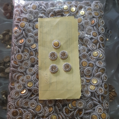 डизाइनर बटन