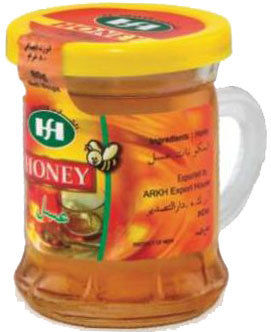 HONEY IN GLASS MUG