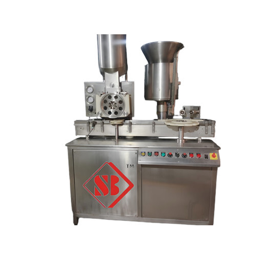 Automatic Vacuum Type Volumetric Injectable Powder Filling And Rubber Stoppering Machine Capacity: As Per The Client Required Kg/Hr