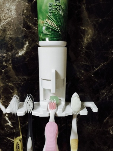 Toothpaste Dispenser and Tooth Brush Holder