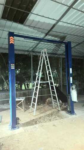 Two Post Car Lift - 4 Tonne Capacity Steel Material 1800 mm Max. Lifting Height | Hydraulic Operation Safe & Secure Design Compact Footprint Easy Vehicle Positioning