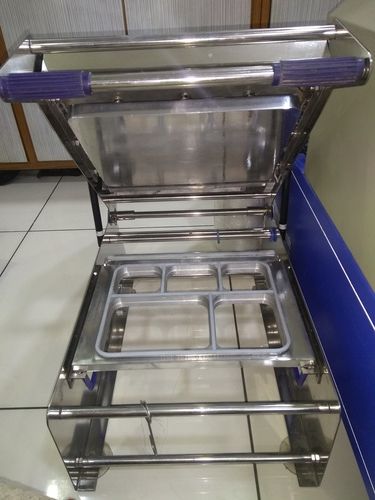 https://tiimg.tistatic.com/fp/5/007/397/semi-automatic-grade-meal-tray-sealer-for-food-packaging-and-sealing-purpose-762.jpg