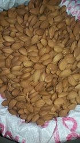 A Grade Brown Oval Shape Sweet Tasty Indian Origin Medium Size Dried Badam Nuts