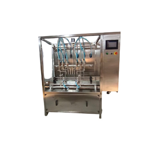 Automatic Four Head Oil Filling Machine - Capacity: 5000 Kg/Day