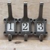 Cast Antique Iron Number Hooks